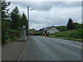 Bus stop and shelter on Airdrie Road (A89) in ML6 8WE
