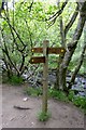 Footpath sign by West Beck in YO22 5JU