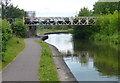 Disused railway bridge across the Trent & Mersey Canal in ST1 5GP