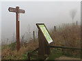 The map and signpost at the Visitor Centre, College Lake, on a foggy day in HP23 5HF