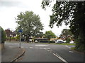 Lightwater Road at the junction of Guildford Road in GU24 9NL