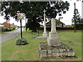 Old broken preaching cross and Wormegay War Memorial in PE33 0SG