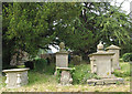 Ornate gravestones in the churchyard at Upton Bishop in HR9 7UL