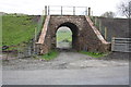 Bridge taking lifted railway over access road to Davy Bank in LA8 0BL