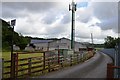 Phone mast and farm buildings at Lower Brockholes in PR2 6LL