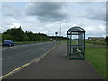 Bus stop and shelter on the A89 in EH48 1JY