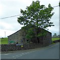 Barn at western end of Grassington Bridge in BD23 5HQ