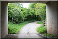 Approaching footpath junction from under the M6 in CA11 0AA