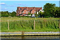 Houses seen from Staffordshire and Worcestershire Canal towpath in WV10 7EQ