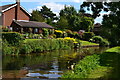 Canalside house and garden at Acton Trussell in ST17 0RS