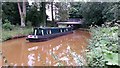 Narrowboat emerging from Knutsford Road Bridge in ST7 3DU