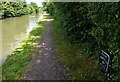 Milepost along the Grand Union Canal towpath in NN11 2PJ