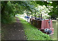 Narrowboat moored along the Grand Union Canal in NN11 2EN