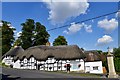 Wherwell: Cottages by the war memorial in SP11 7JG