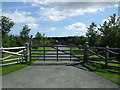 Gated road to Heathery Edge in NE43 7UH
