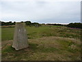 East Dean trig and cyclists in BN20 8EA