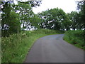 Sharp bend in the road near Steel Rigg in NE19 2AY