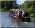 Narrowboat heading west along the Trent & Mersey Canal in Shardlow