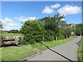 Looking down the lane towards Hutton Parish Church in TD15 1TP
