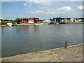 Bungalows beside the River Thurne in NR29 5JU