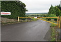 Yellow barrier across  a side road below Pontarddulais Road, Llangennech in SA14 8YB