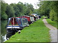 Narrowboats moored along the Grand Union Canal in UB9 6AR