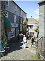A narrow street in Padstow in PL28 8DA