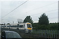 View of a Shoeburyness-bound c2c train passing the High Street in West Leigh Ward