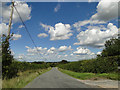 Approaching Cowlinge Corner under blue skies in CB8 9PW