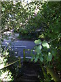 Footpath reaches Storrington Road down steps in Abingworth