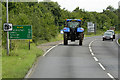 Tractor on the A148 near Fakenham in NR21 9QZ