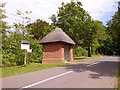 Thatched bus shelter in Bloxworth in BH20 7EX