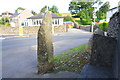 Stone seat and post at junction of Raines Road with Station Road in BD24 0DD