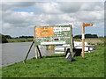 Signs beside the footpath along the River Thurne in NR29 3BT