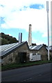 Telecoms pole and old mill chimney, Thrupp in GL5 2LT