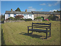 Bench and cottages, Over Kellet in Over Kellet