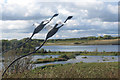 Sculptured Birds fly over the College Lake Nature Reserve in HP23 5HF