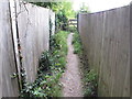 Footpath enclosed by high fences, Bledlow in HP27 9PD