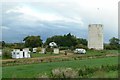 Caravan site and water tower at Fen Bridge in PE6 0HJ