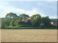 Norfolk House seen from footpath across field in BN13 3UL