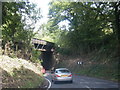 A4109 Neath Road passes under railway bridge in SA10 8SH