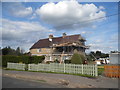 Row of houses on Low Road, Essendon in AL9 6AB