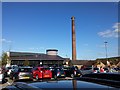 The car park and chimney in Swadlincote in DE11 8LT