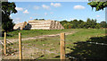 Stacks of straw bales in NR29 4NB