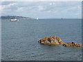 Looking across Torbay to Torquay from Breakwater Beach, Brixham in TQ5 9AH