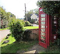 Red phonebox on a Yeoford corner in EX17 5PP