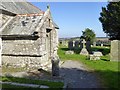 Celtic cross outside porch of Mabe church and the churchyard in TR10 9JF