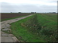 Drain and farm track off March Road (B1100) in PE14 9SF