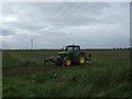 Tractor near drain, Upwell Fen in PE14 9PL