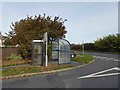 Phone box and bus shelter on the junction of Fairway and Grimsby Road Waltham in DN37 0QB